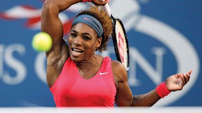 Serena Williams returns a shot to Victoria Azarenka during the women's singles final of the 2013 U.S. Open tennis tournament in New York City on Sept. 8, 2013. Williams won the match which gave her a career total of 17 Gram Slam titles.
